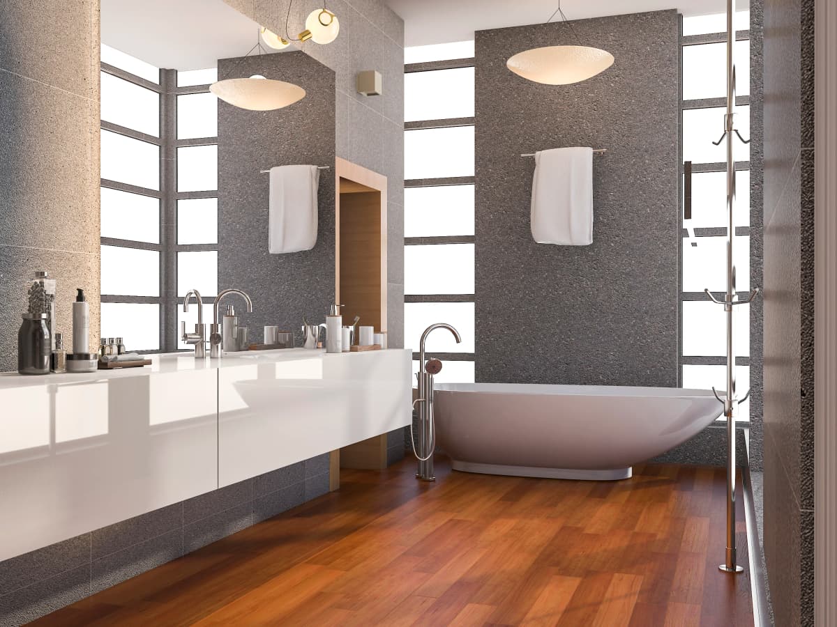 A beautiful modern bathroom with a freestanding tub.