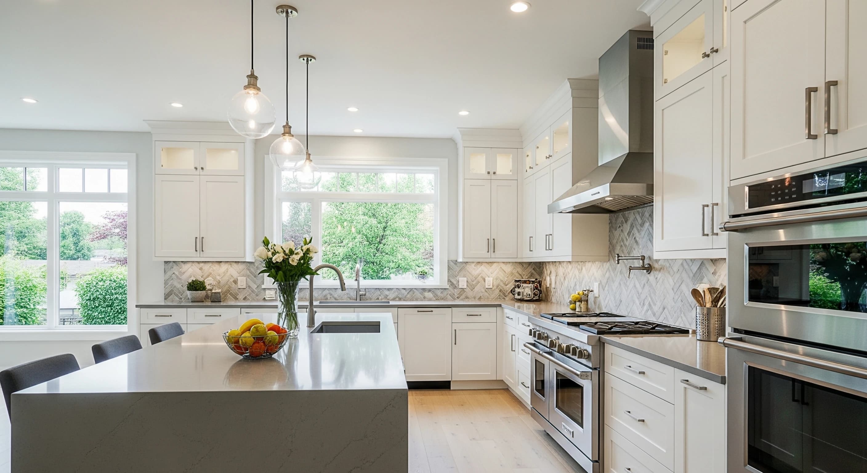 The completed modern kitchen remodel with a large central island