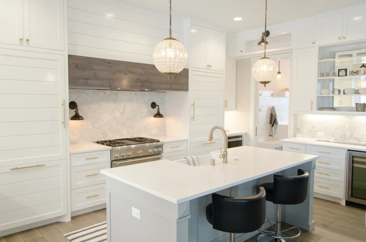 Spacious kitchen with dark cabinets and a breakfast bar