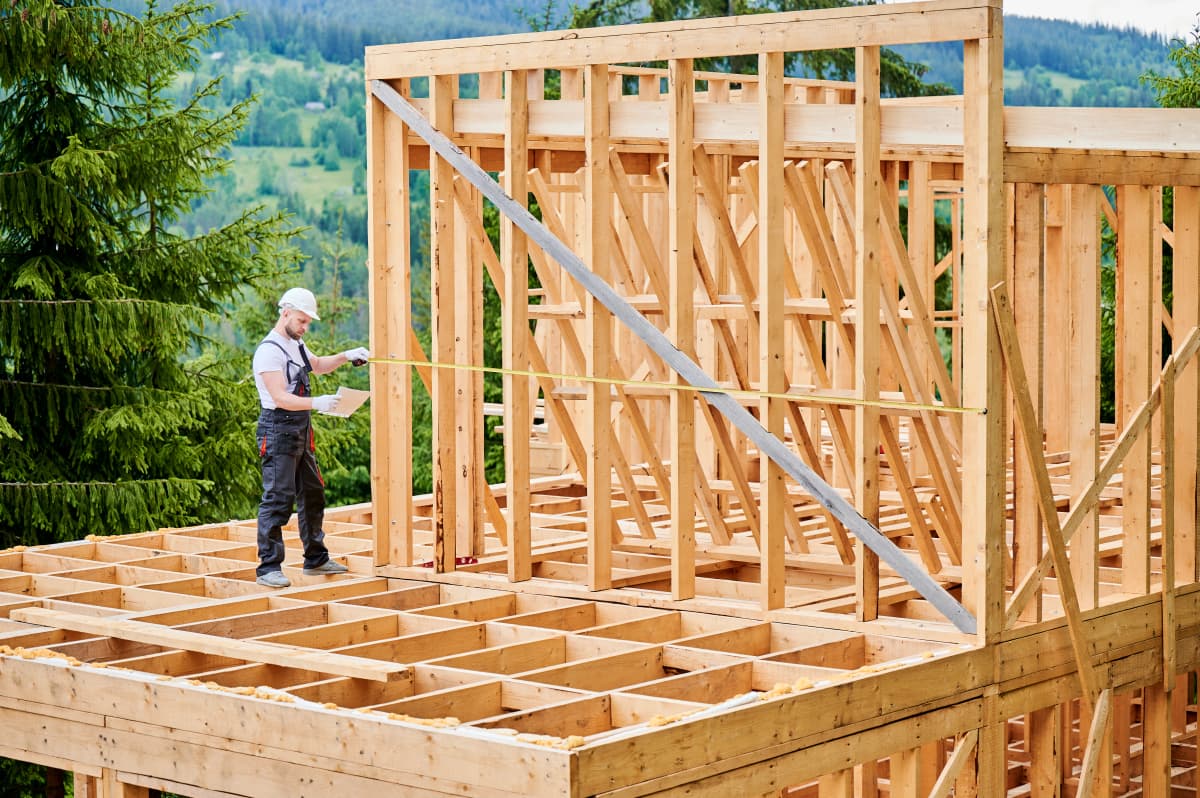 New wood framing for an open-concept layout during a major renovation.